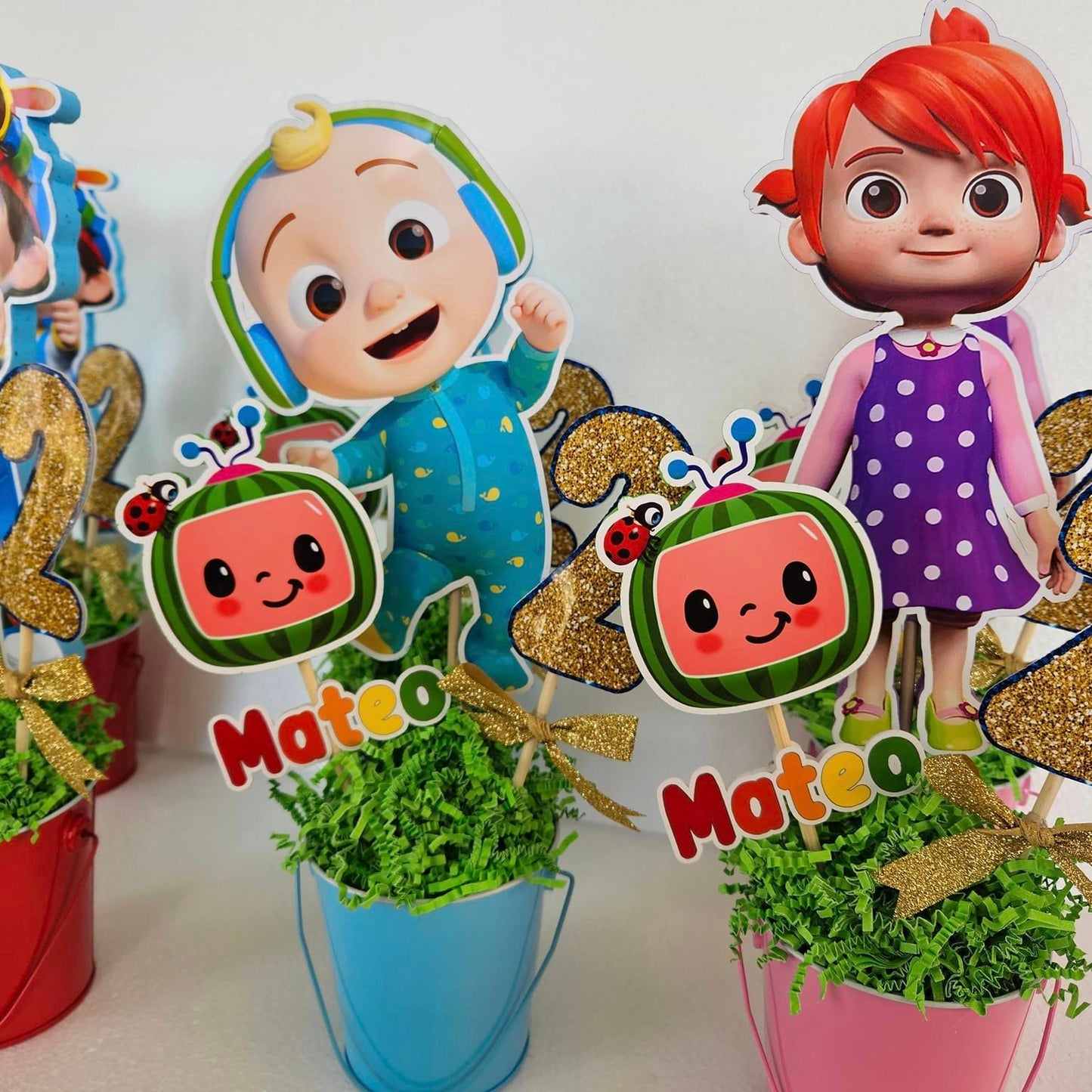 Custom Cocomelon family group centerpiece with child’s name and age for birthday table decor