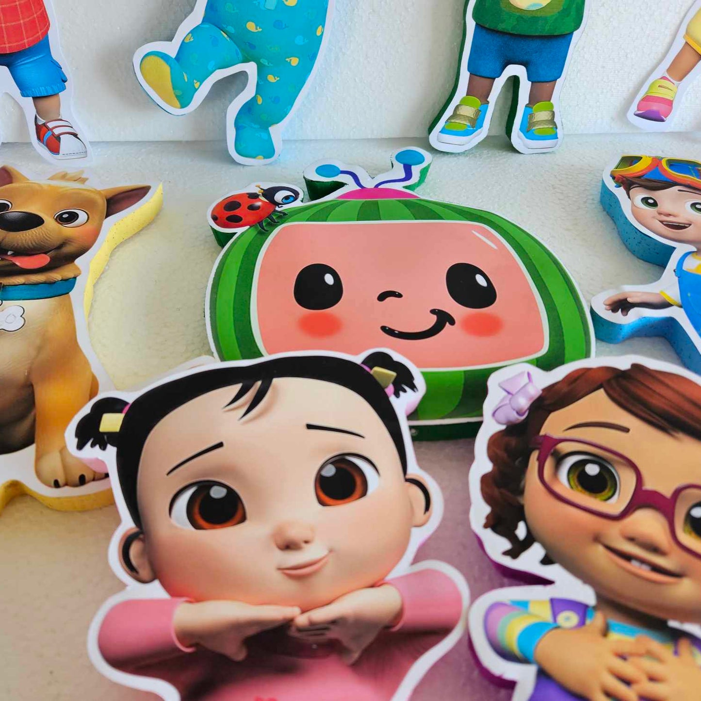 Cocomelon printed foam figure of JJ with mesh ribbon edging