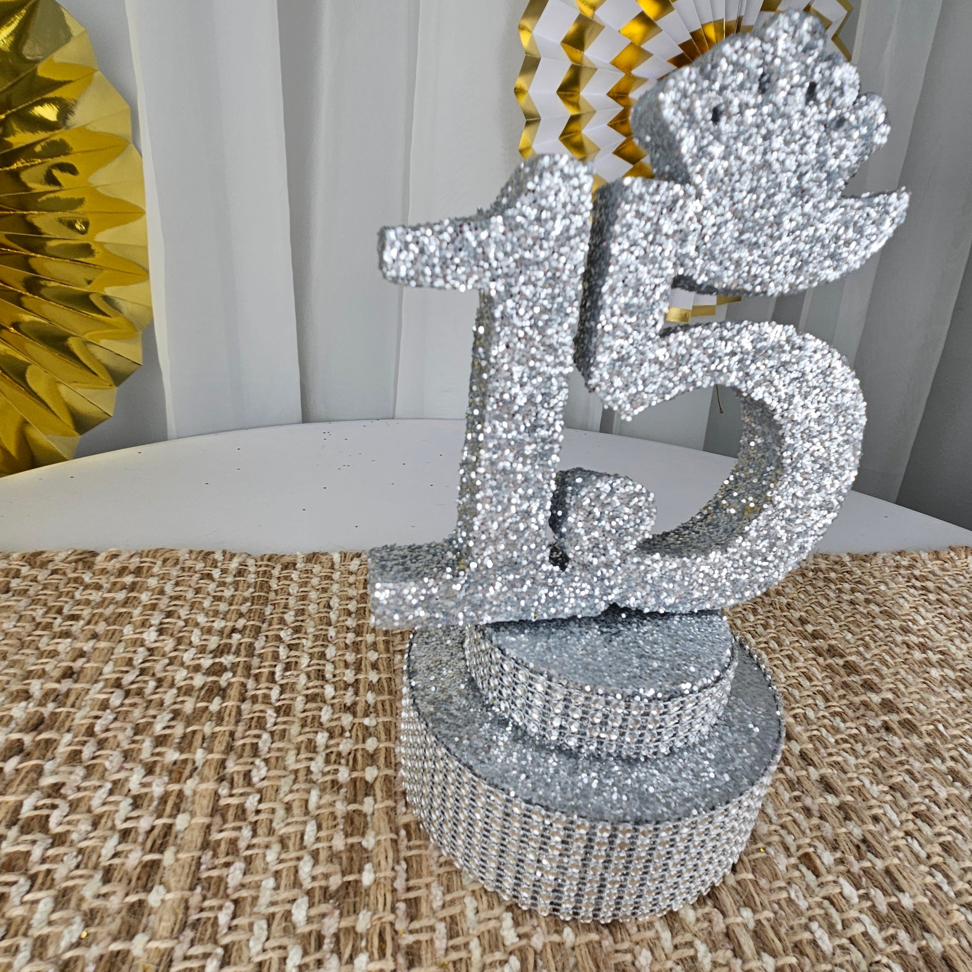 Sweet fifteen silver centerpiece for party table display