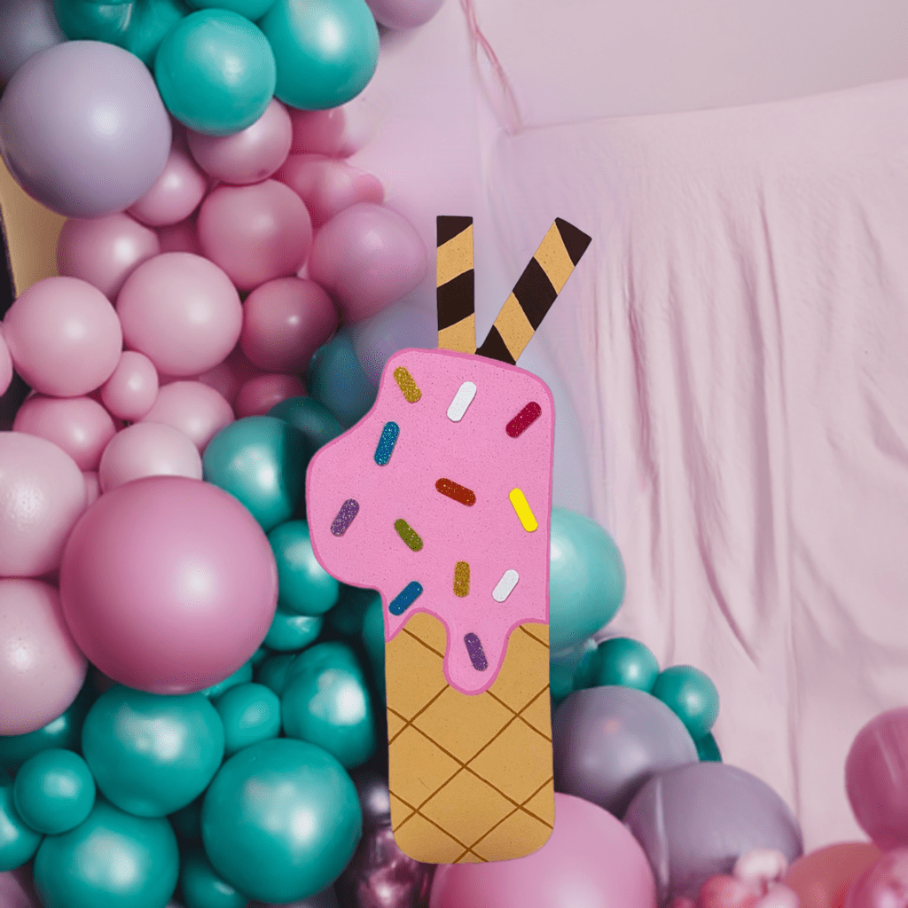 Fun and festive ice cream-shaped number one with dripping chocolate and candy sprinkles