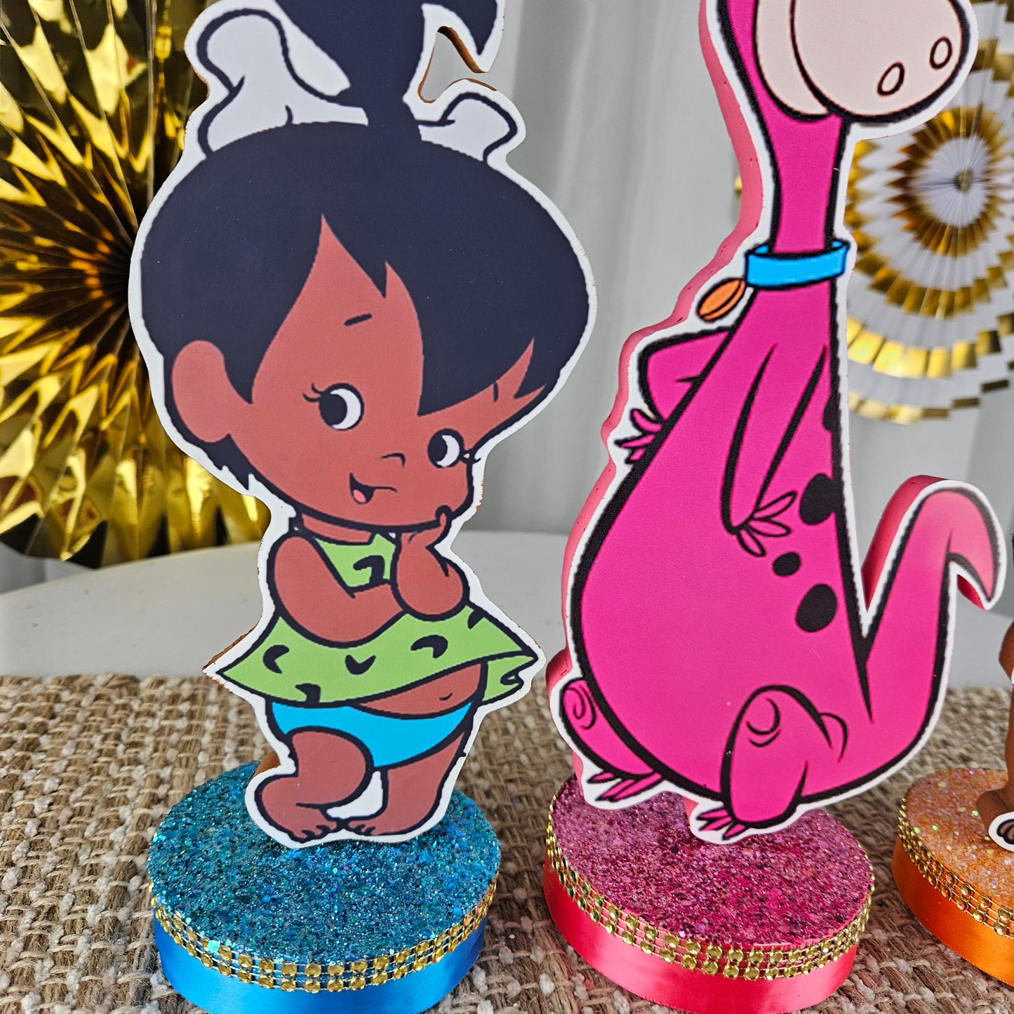 Unique Flintstones centerpiece with glitter, mesh, and African American characters