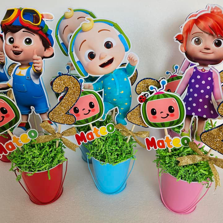 Cocomelon-themed birthday table decorations with handmade centerpiece