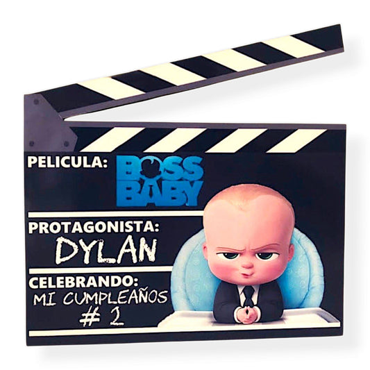Custom Boss Baby clapperboard centerpiece with glitter, personalized with name and age, perfect for birthday party or baby shower.