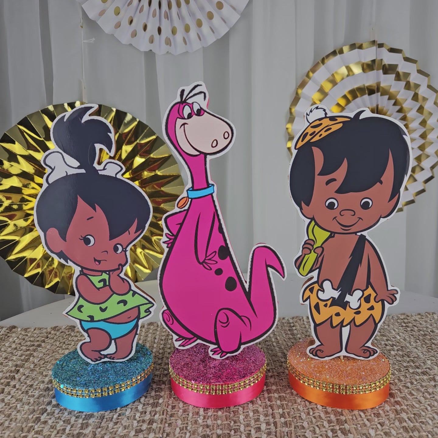 Handmade Flintstones centerpiece with Bam Bam, Pebbles, Dino, and friends