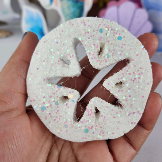 Hand-painted foam starfish cutout with glitter, perfect for under the sea birthday decor.