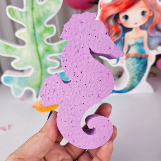 Handmade purple seahorse foam cutout for party decoration, perfect for centerpieces and kids' birthday celebrations.