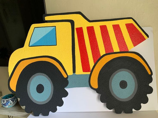 Handmade foam construction dump truck cutout centerpiece for kids' birthday party decoration